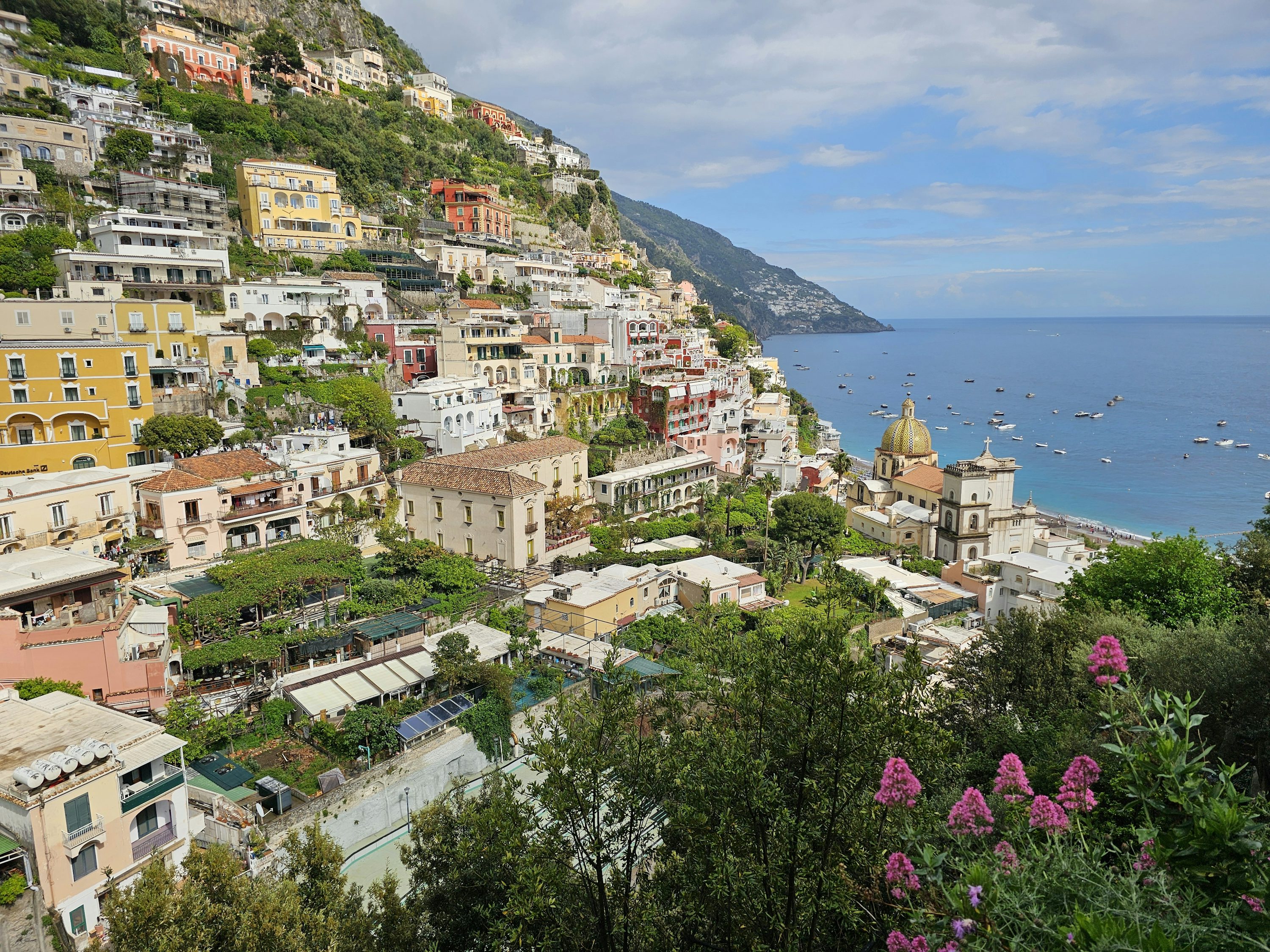 Positano Italy pastel buildings cascading down cliffs to the sea Amalfi Coast