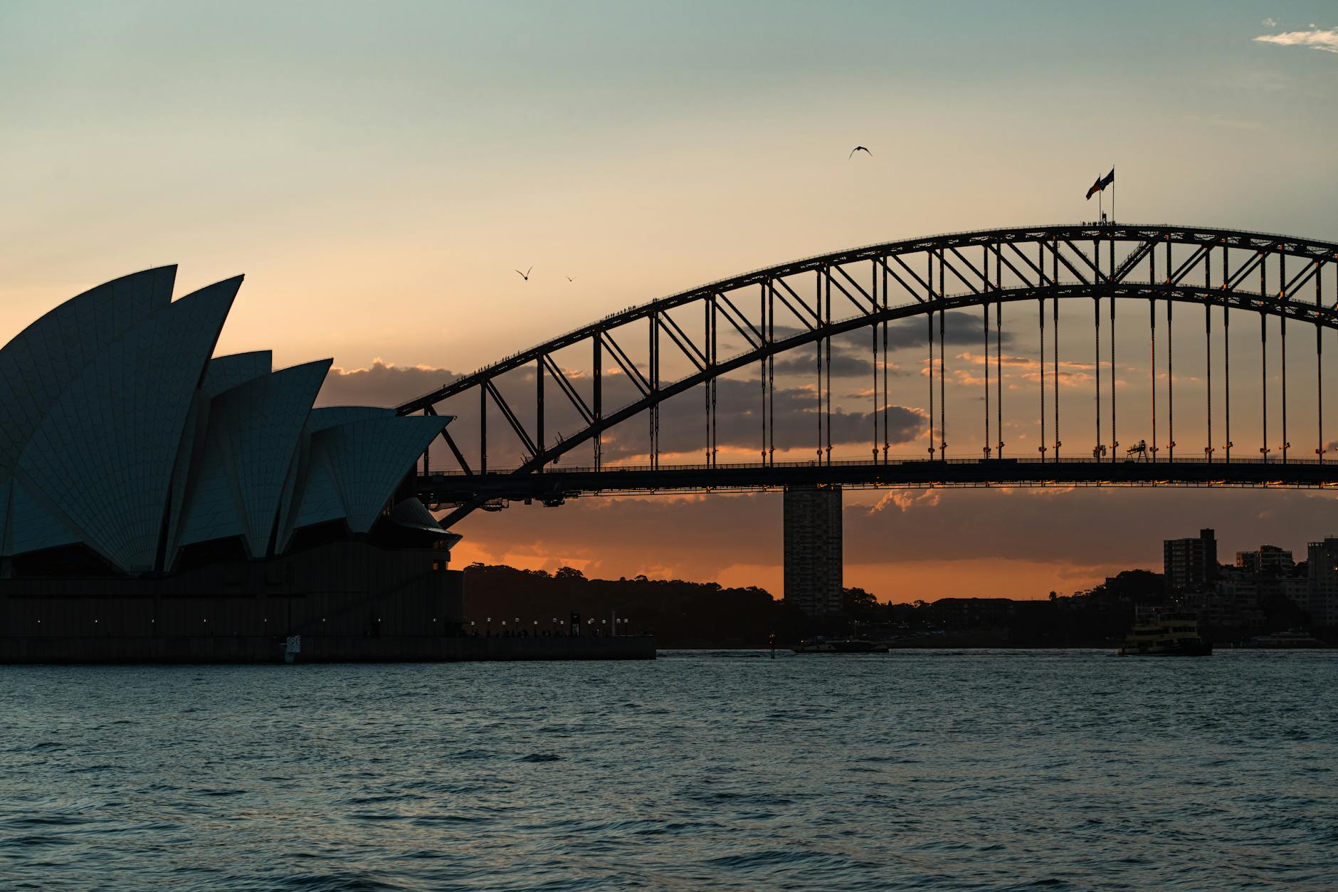 Sydney Opera House Australia Harbour Bridge silhouette sunset orange sky
