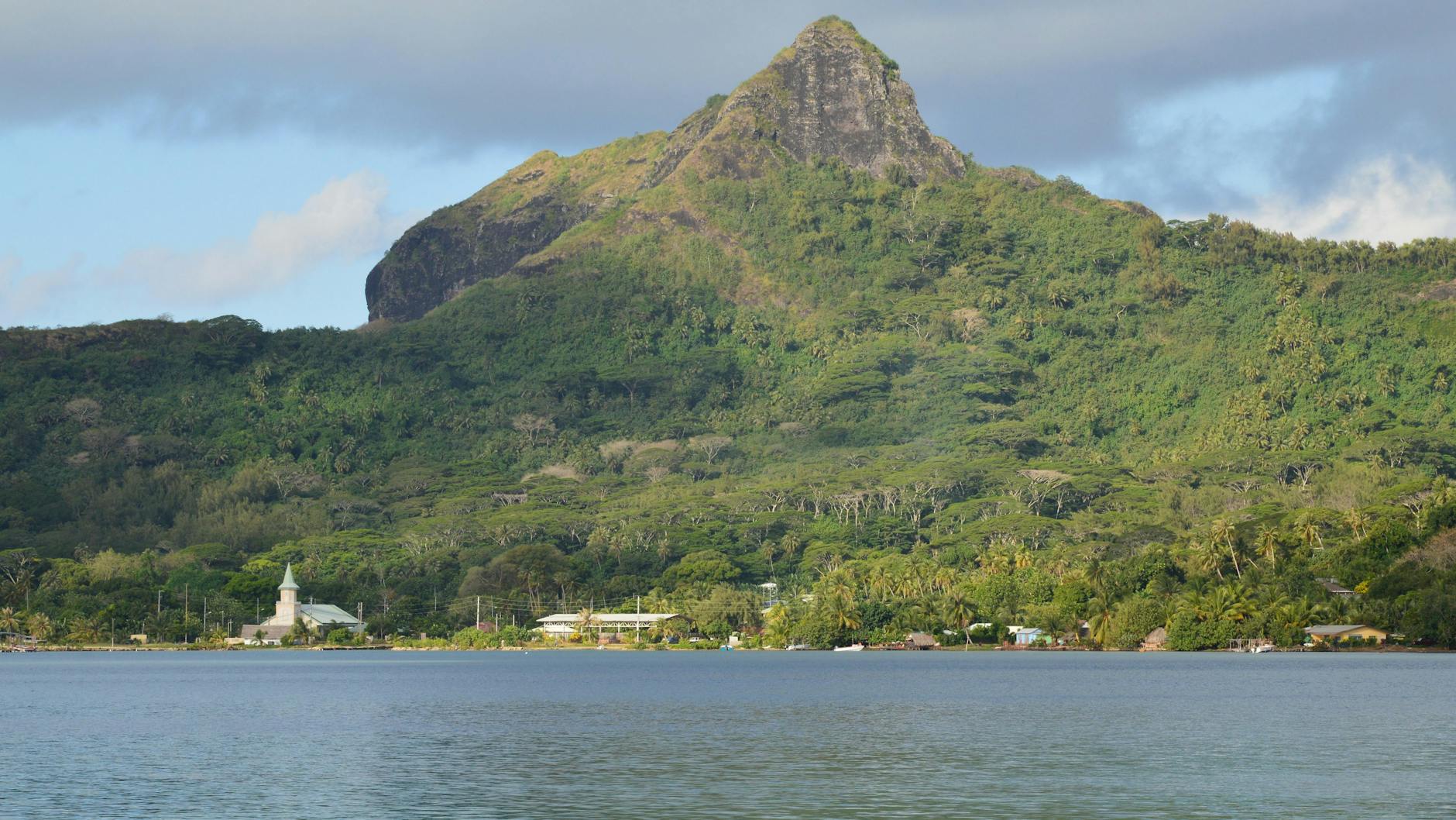 Bora Bora French Polynesia volcanic peak Pahia lagoon village church waterfront