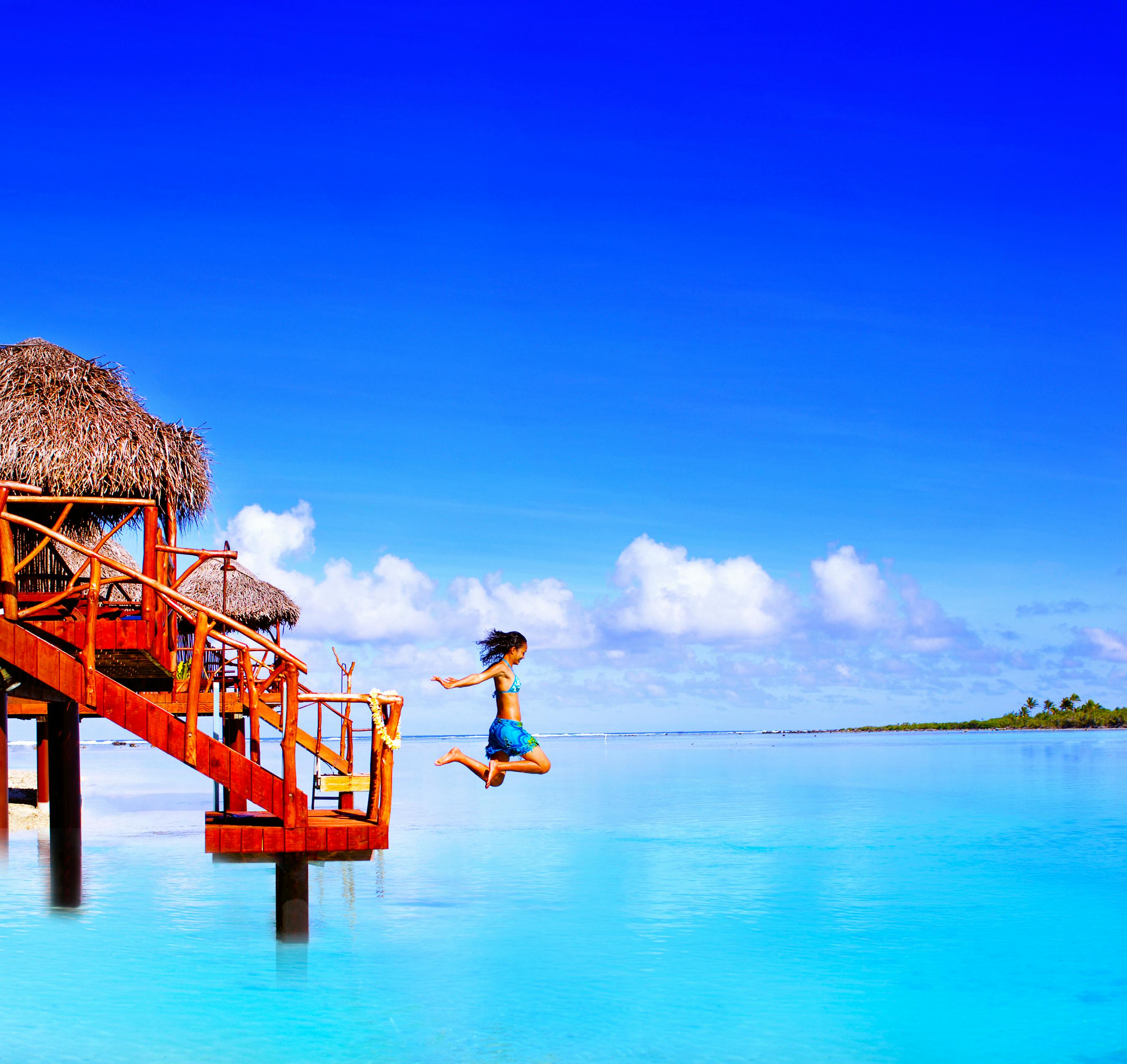 Cook Islands Aitutaki overwater bungalow turquoise lagoon tropical