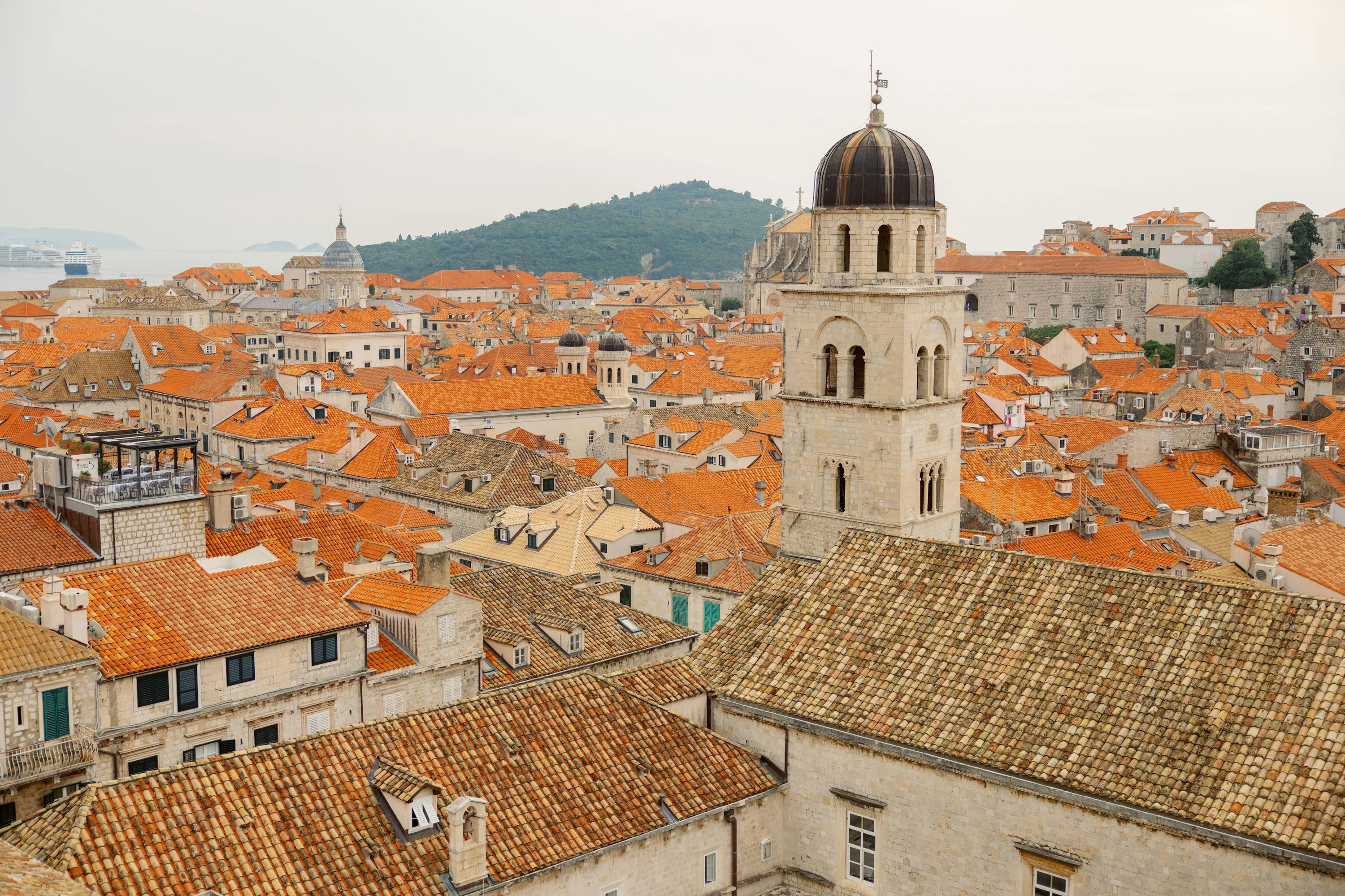 Dubrovnik Croatia old city bell tower and terracotta rooftops from above