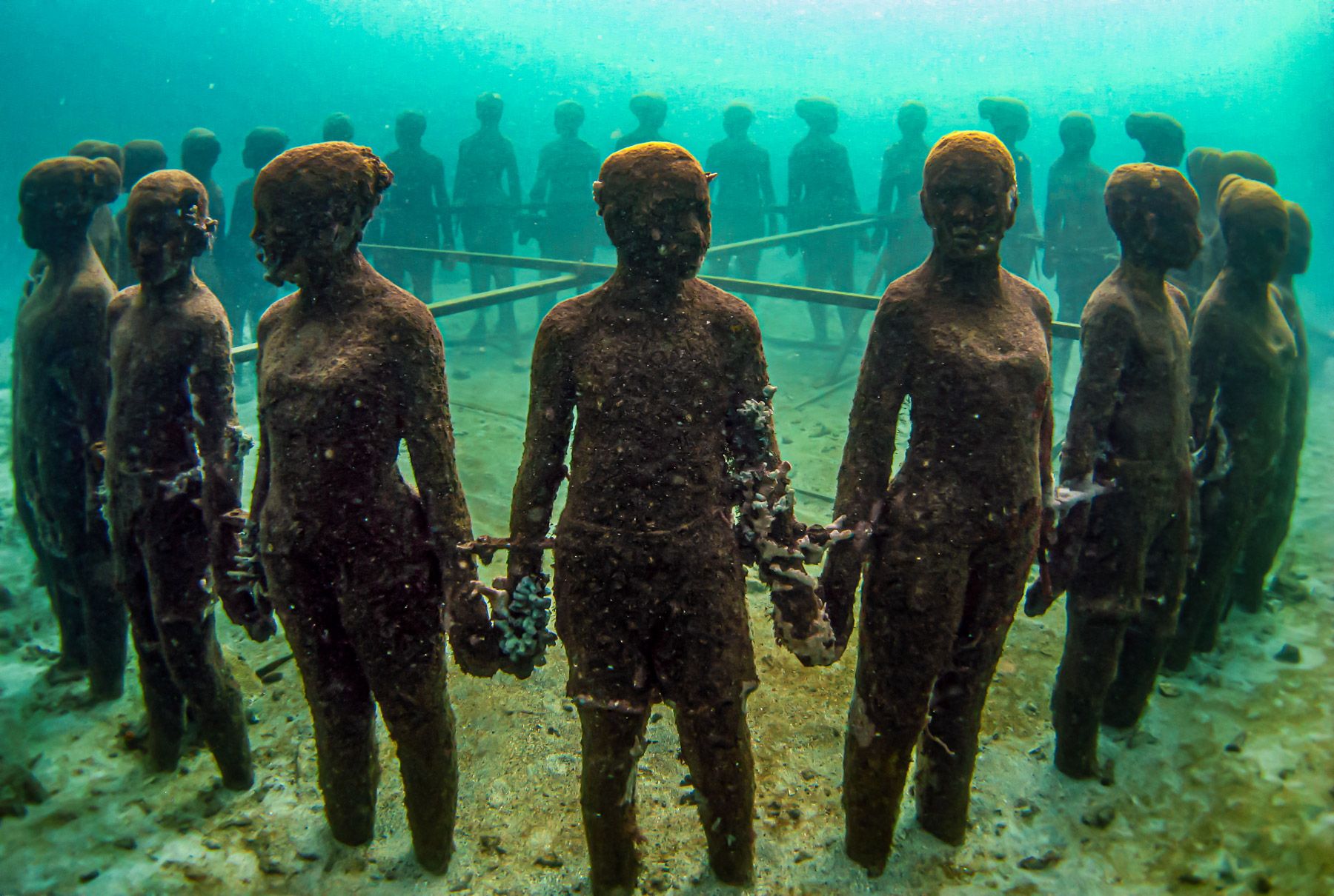 Grenada Underwater Sculpture Park submerged figures coral reef Caribbean