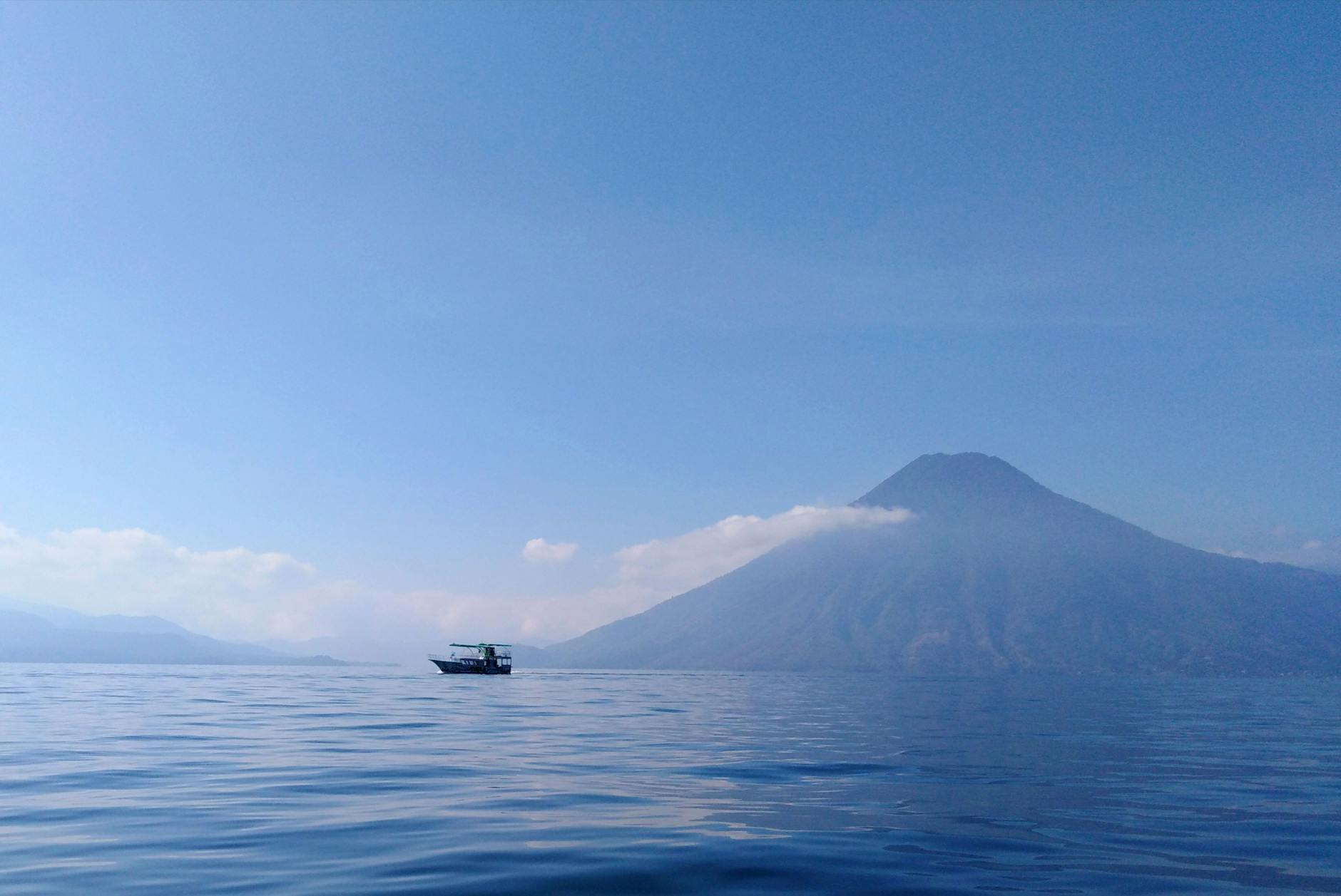 Lake Atitlan Guatemala volcanic lake boat volcano misty morning