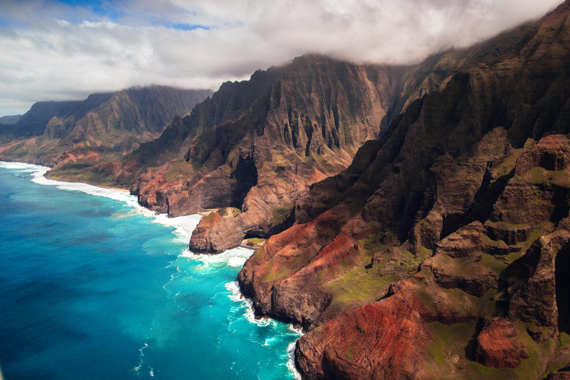 Na Pali Coast Kauai Hawaii dramatic sea cliffs aerial view