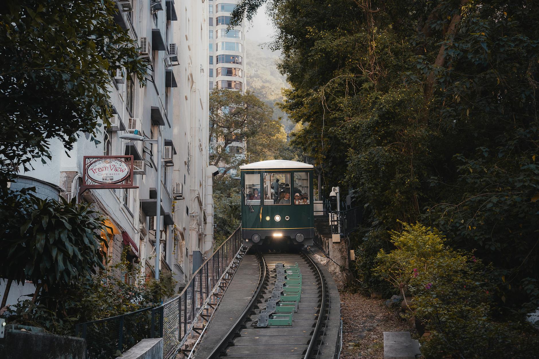 Hong Kong Peak Tram historic funicular steep hillside lush trees