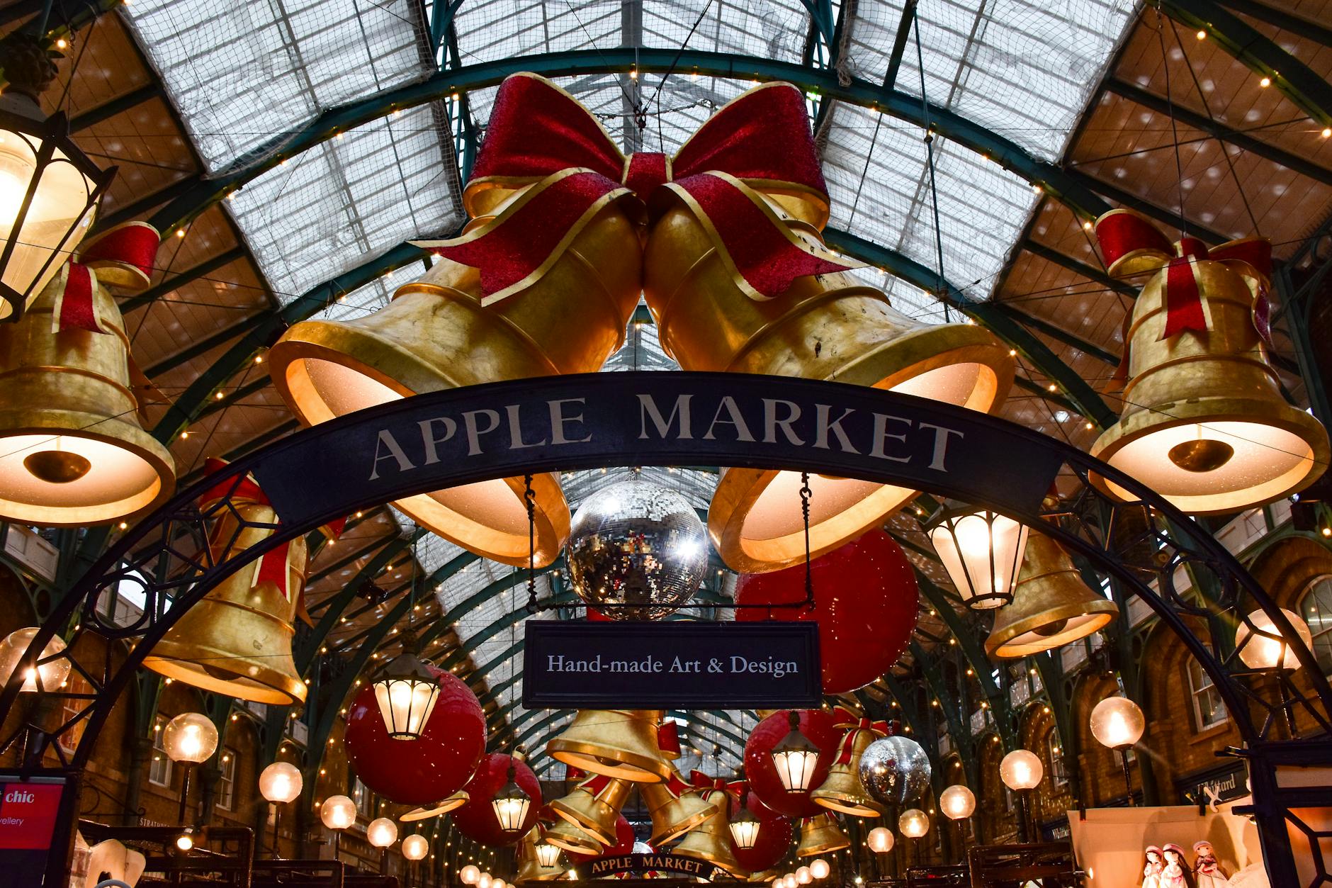 Covent Garden Apple Market London England Christmas decorations golden bells interior