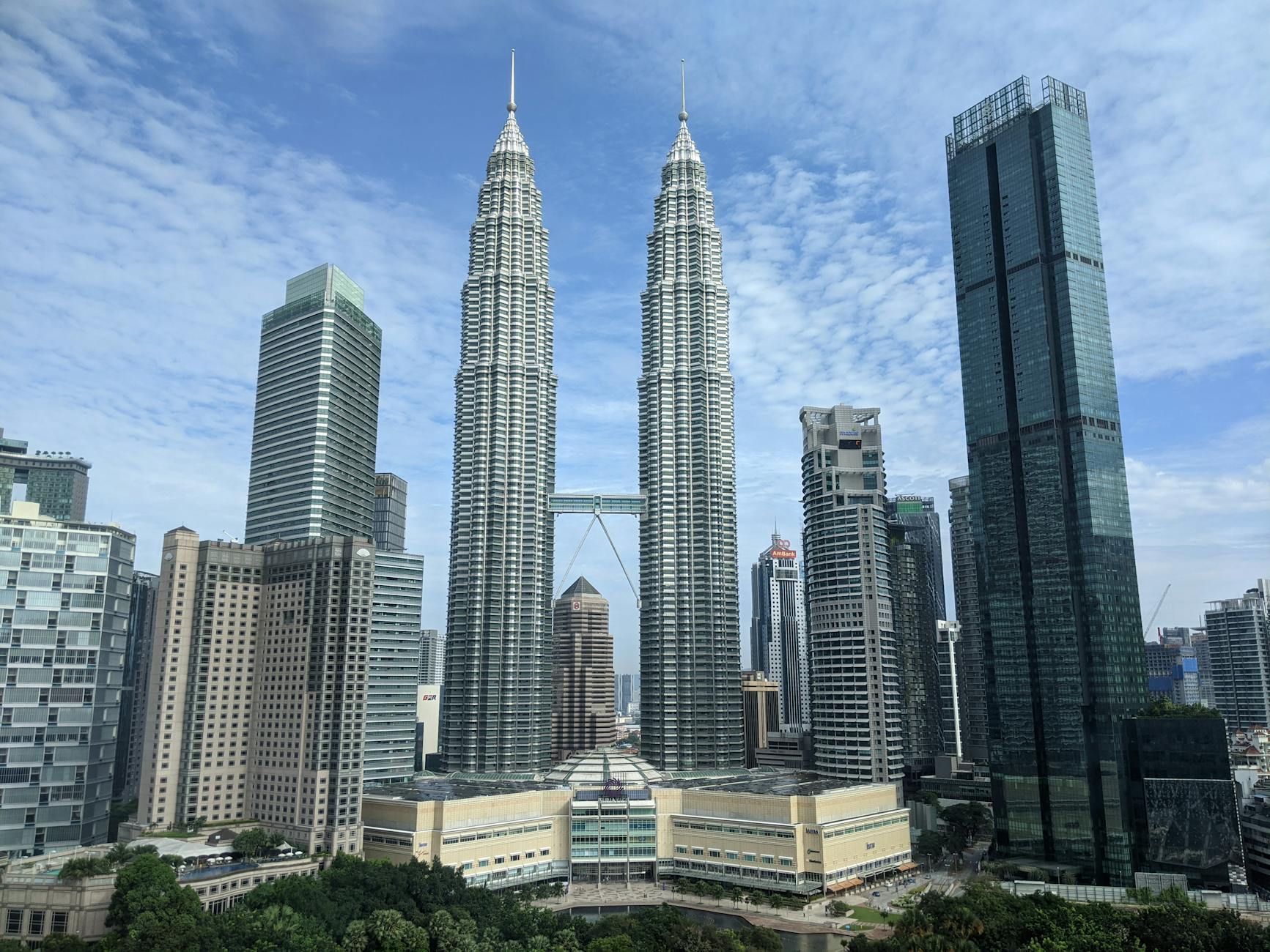 Petronas Twin Towers Kuala Lumpur Malaysia iconic skyline blue sky