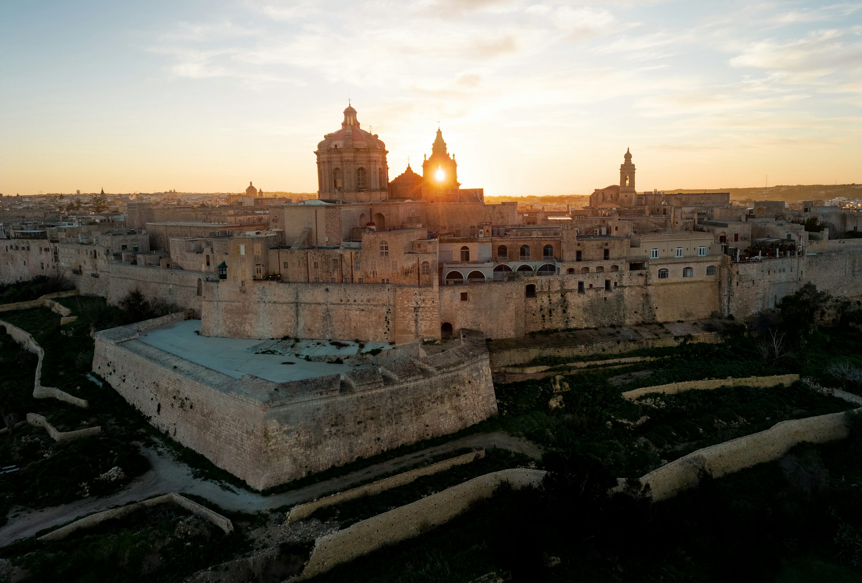 Valletta Malta sunset over the ancient walled capital city of Malta