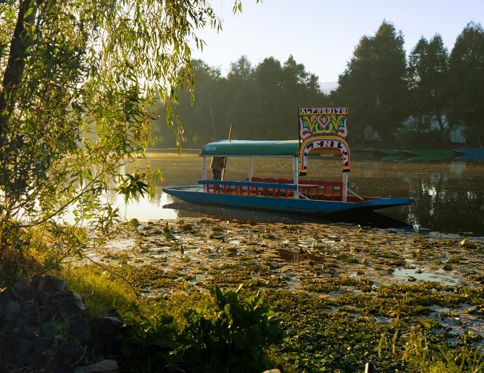 Xochimilco floating gardens Mexico City trajinera colourful canal boat