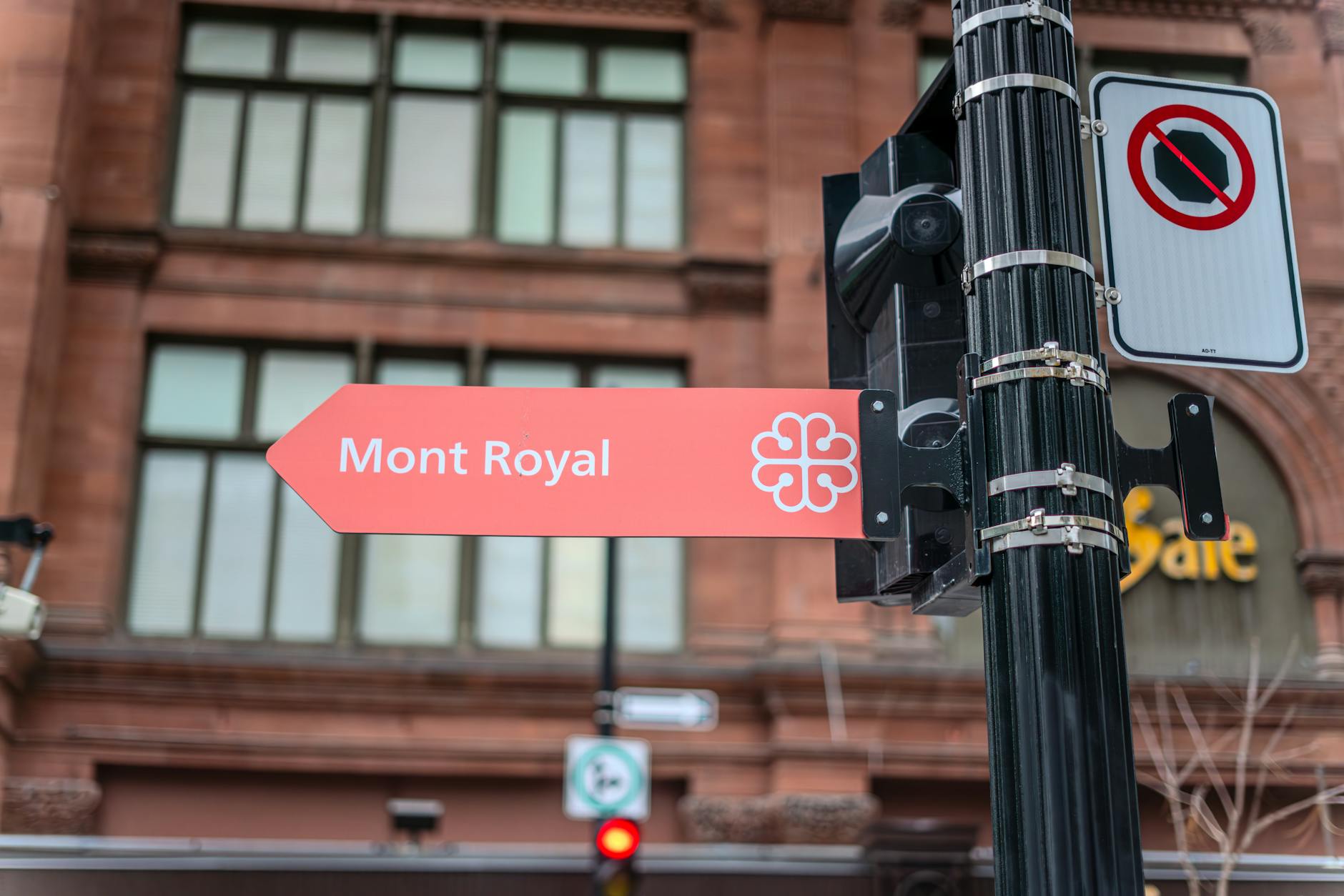 Mont Royal directional street sign Montreal Canada red brick building