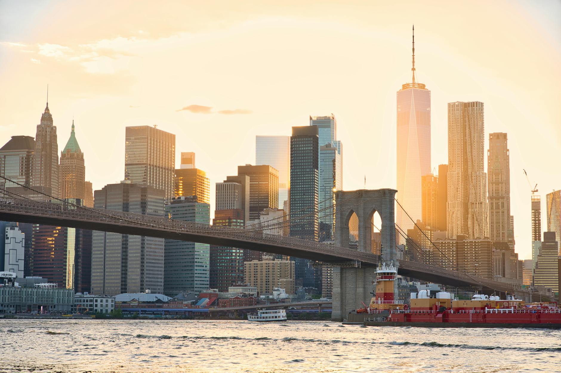 Brooklyn Bridge New York City USA golden hour sunset Manhattan skyline One World Trade Center