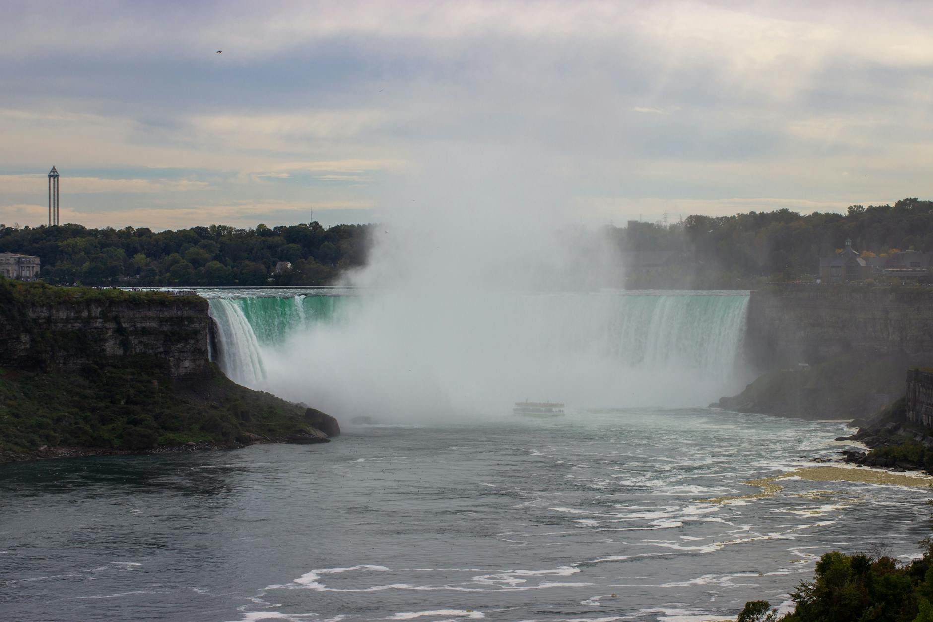 Horseshoe Falls Niagara Canada aerial view massive curved waterfall mist Skylon Tower