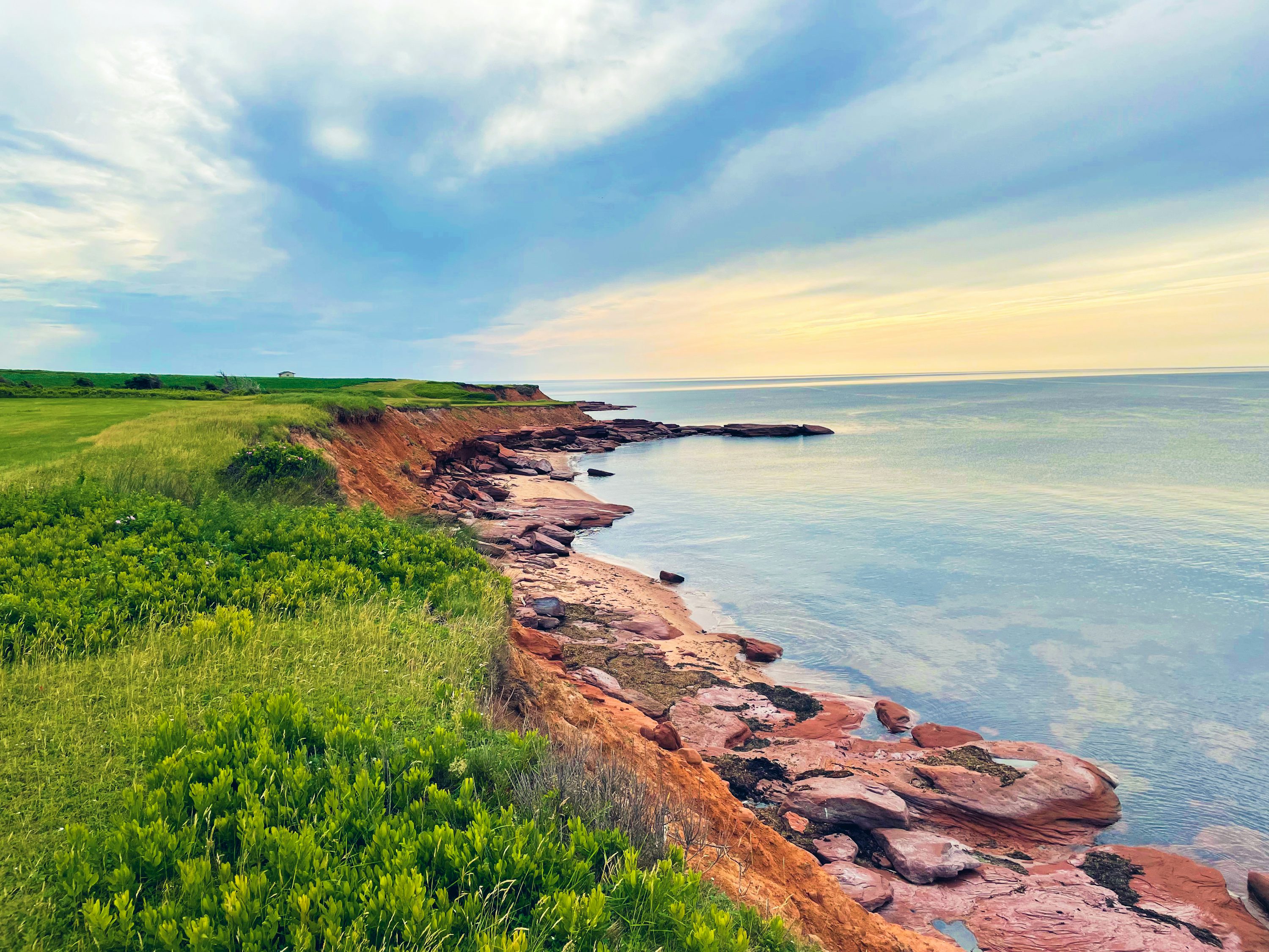 Prince Edward Island green coastal cliffs and Gulf of St Lawrence PEI Canada