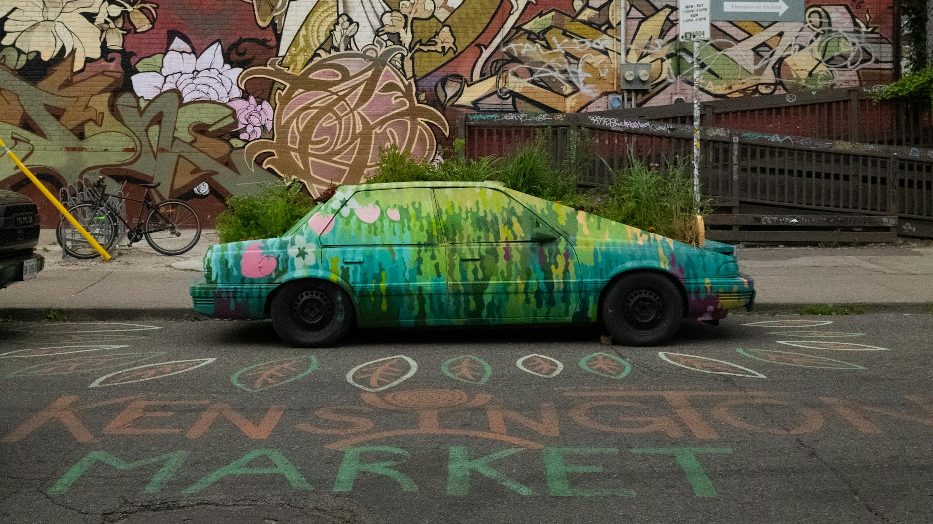 Toronto Kensington Market painted car graffiti mural colourful neighbourhood