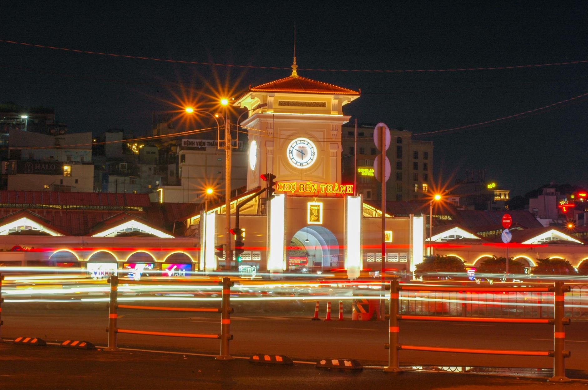 Ben Thanh Market Ho Chi Minh City Vietnam night light trails clock tower