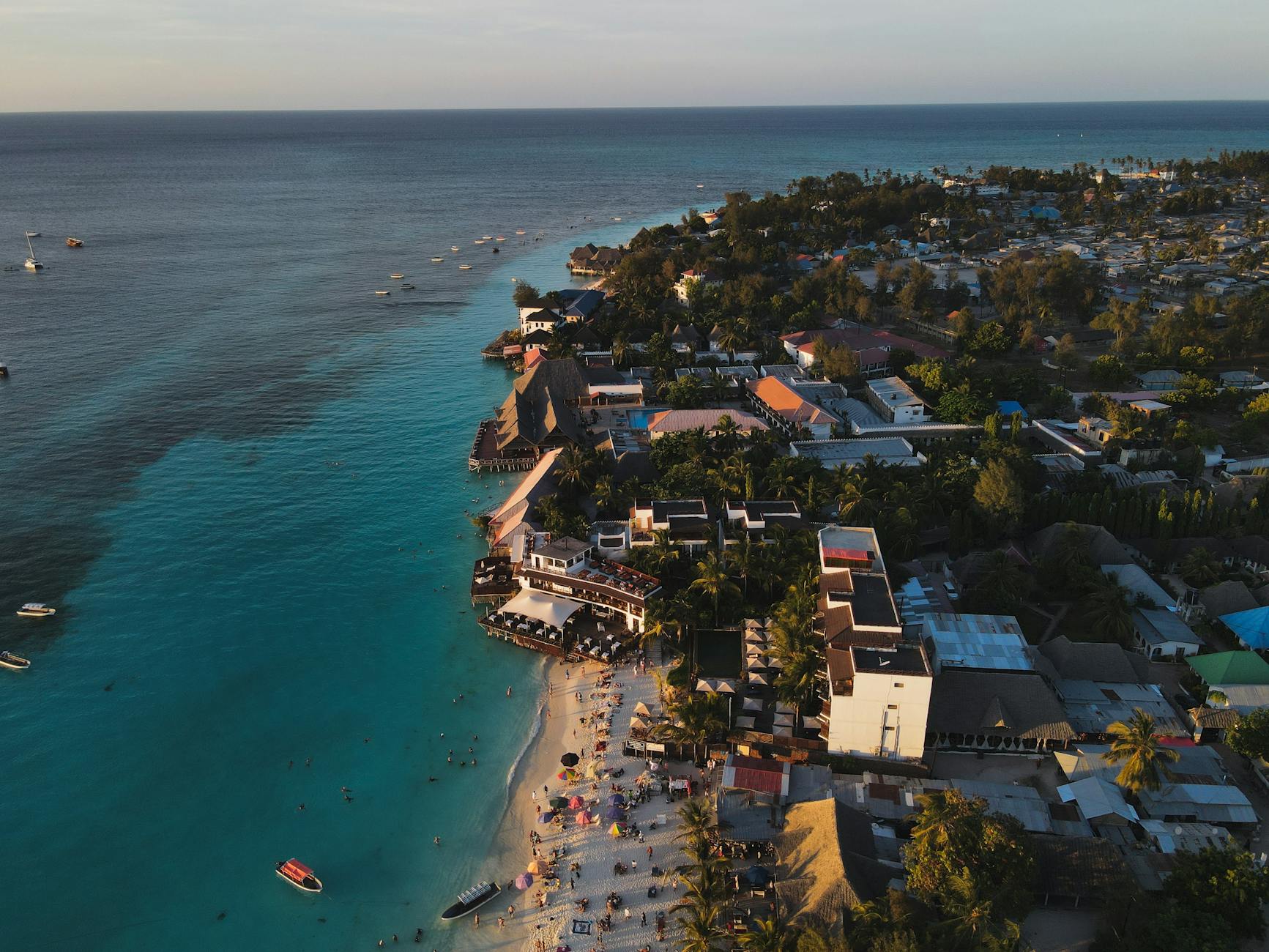 Nungwi Beach Zanzibar Tanzania turquoise water resort aerial sunset